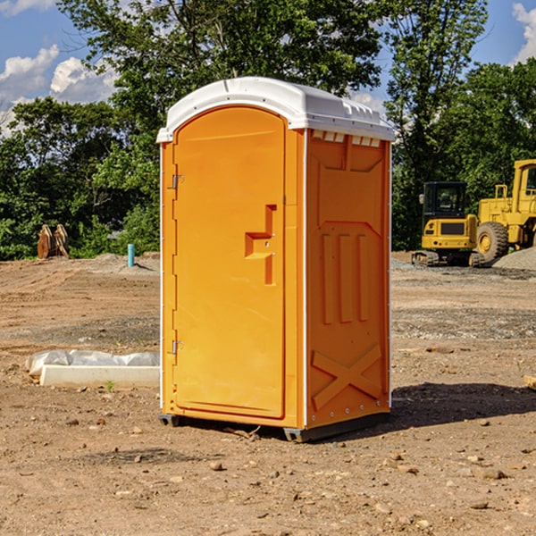 how often are the portable restrooms cleaned and serviced during a rental period in Covington